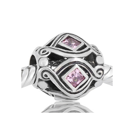 Abalorio con piedras rosas